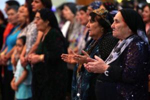 Iraqi Christians pray during a mass at the Saint-Joseph church in Arbil, the capital of the autonomous Kurdish region of northern Iraq, on July 20, 2014.(Photo: AFP-Safin Hamed)