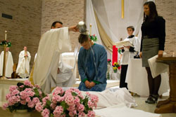 Holy-Cross-College-Receiving-Sacraments-1